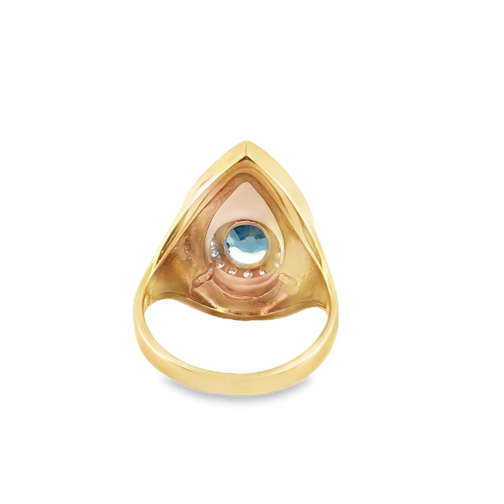 14K Yellow Gold Ring with Oval Blue Topaz and 0.18 CTW Round Diamonds, Size 7.5