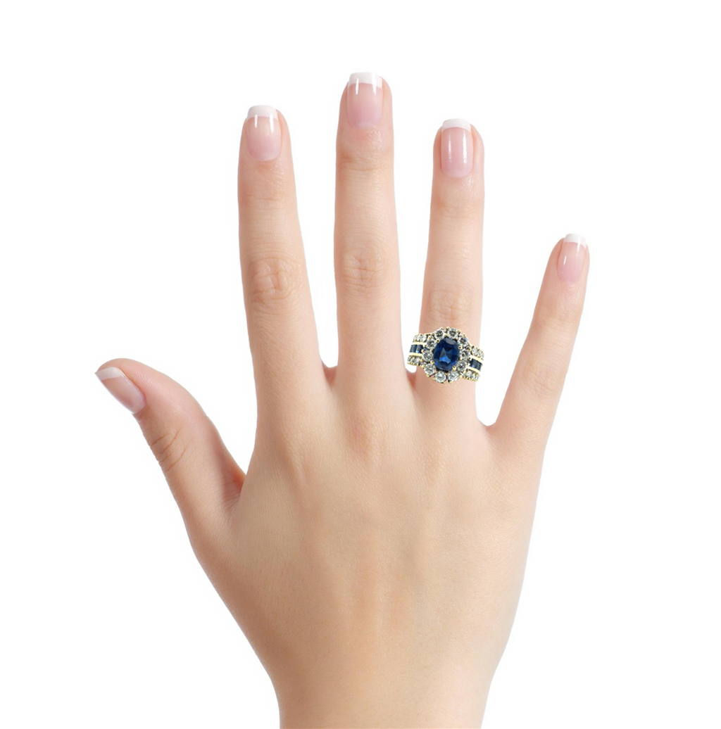 18K Ring with 2.51 CT Oval Blue Sapphire and 2.44 CTW Round G VS1 Diamonds