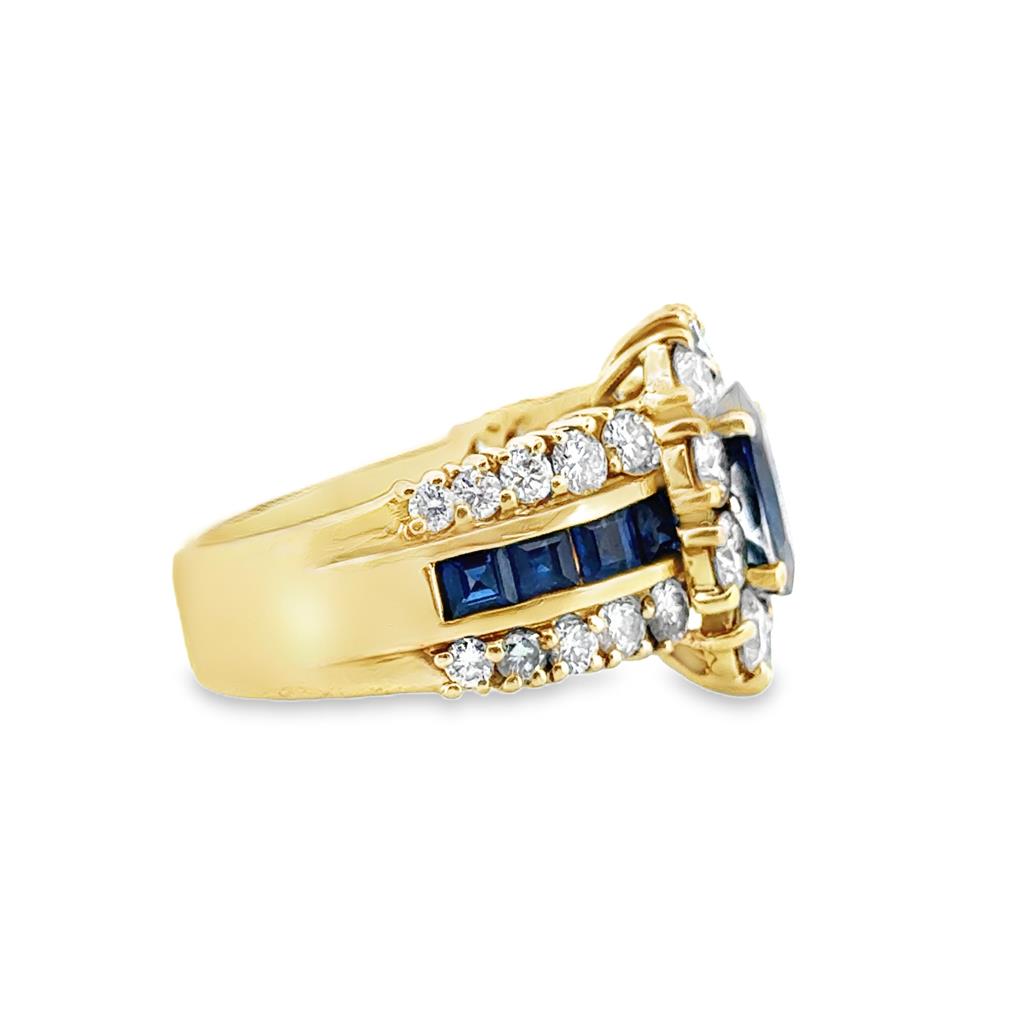 18K Ring with 2.51 CT Oval Blue Sapphire and 2.44 CTW Round G VS1 Diamonds