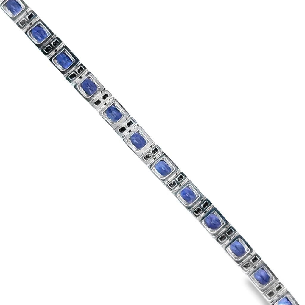 White Gold 14K Bracelet With = 5.04Tw Oval Tanzanites And = 0.72Tw Round Diamonds