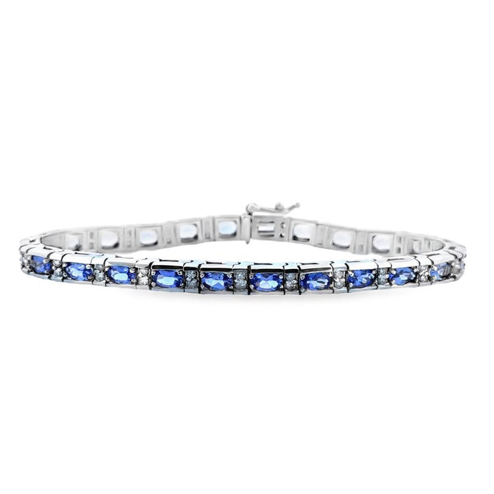 White Gold 14K Bracelet With = 5.04Tw Oval Tanzanites And = 0.72Tw Round Diamonds