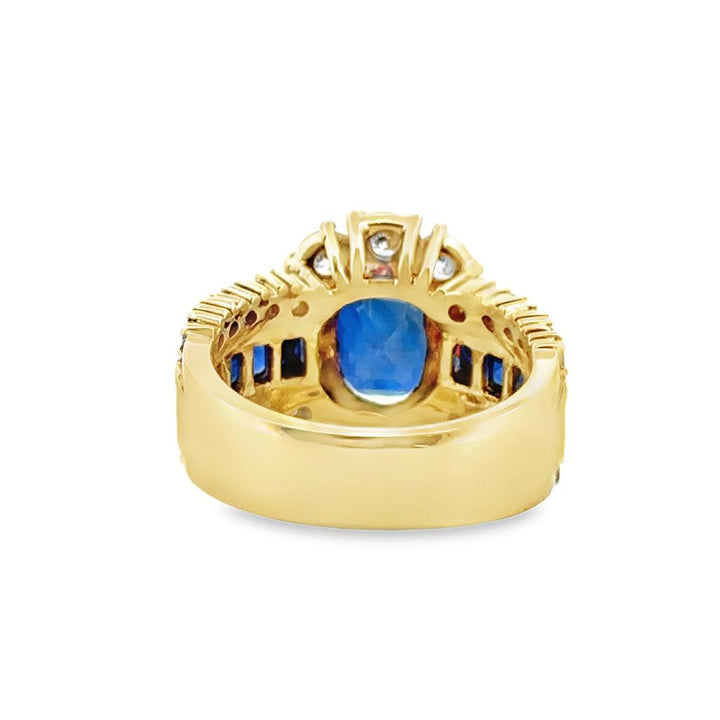 18K Ring with 2.51 CT Oval Blue Sapphire and 2.44 CTW Round G VS1 Diamonds