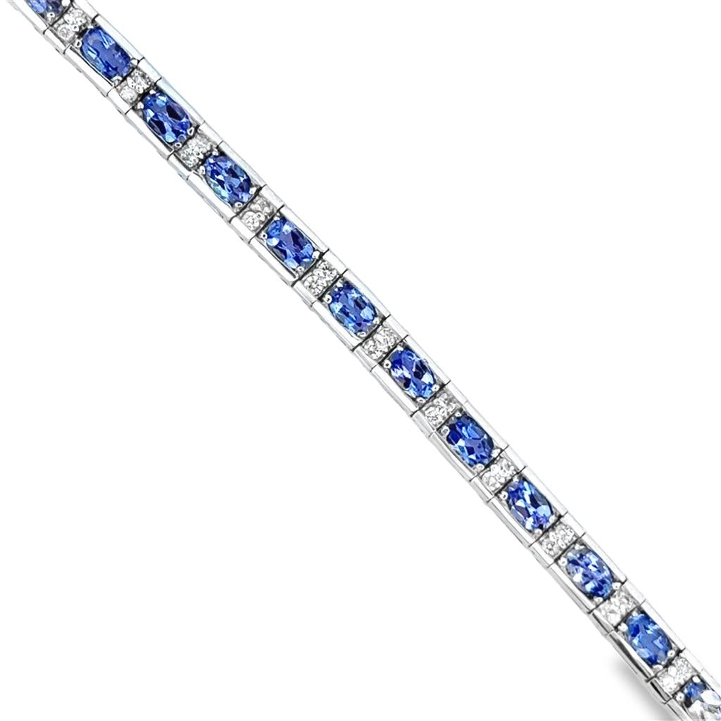 White Gold 14K Bracelet With = 5.04Tw Oval Tanzanites And = 0.72Tw Round Diamonds